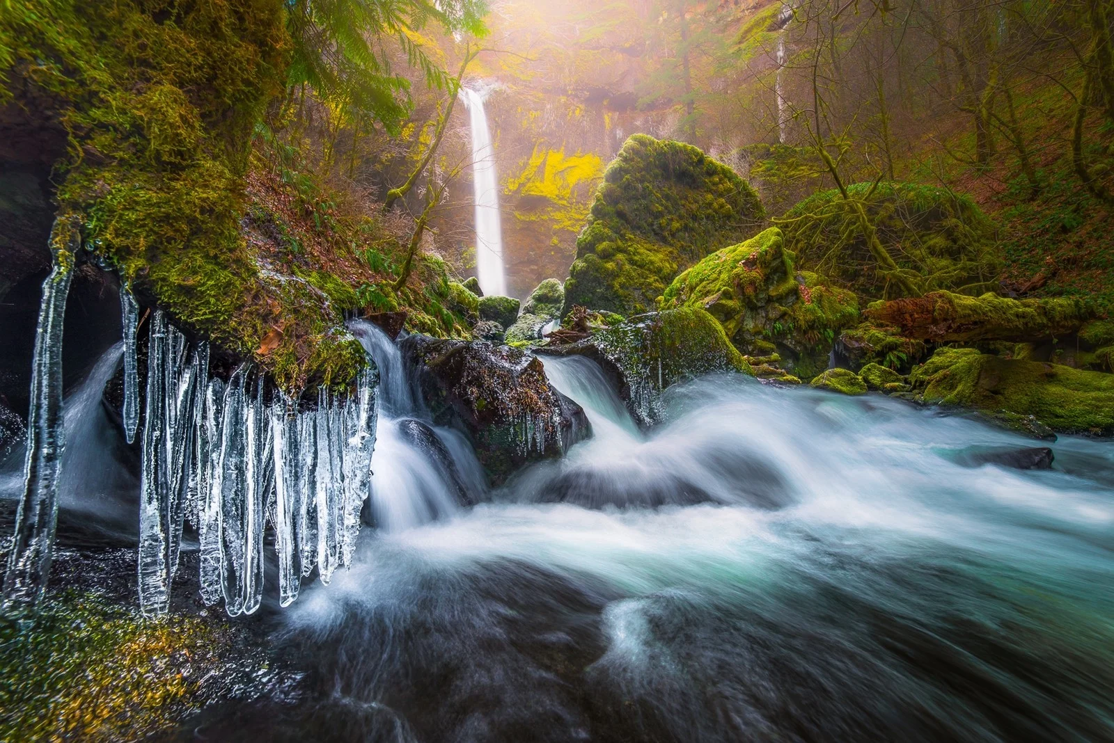 A Mossy Forest Stream Falling Over Rocks In Long Exposure